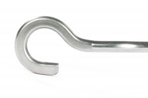 Wire hook made of spring steel wire with embossed hook end and milled recess on top side